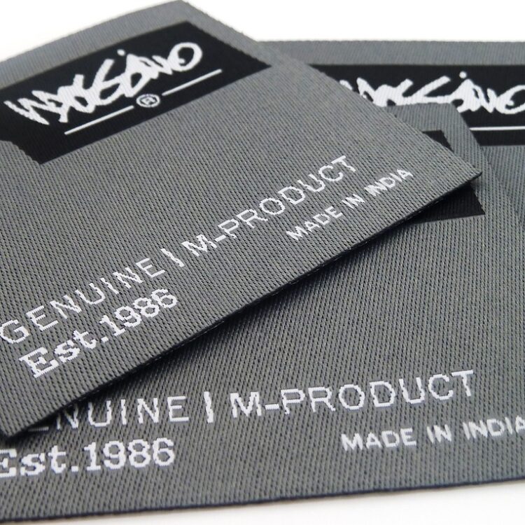 label, clothing label, woven label, tag, gray clothes, clothing label, clothing label, woven label, woven label, woven label, woven label, woven label